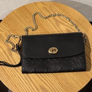 Coach Black Leather Clutch with Gold Accents